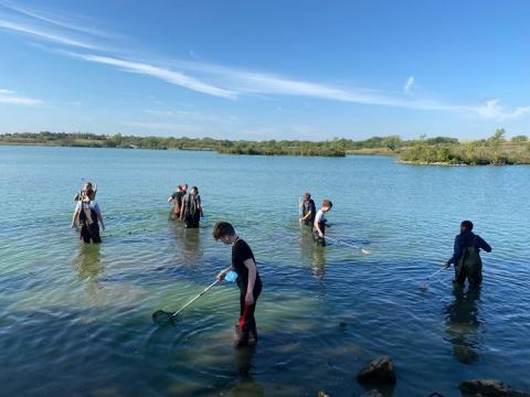 kids fishing in lake 