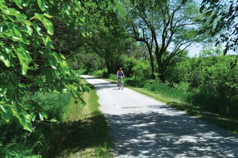 person biking on Oak Creek trail 