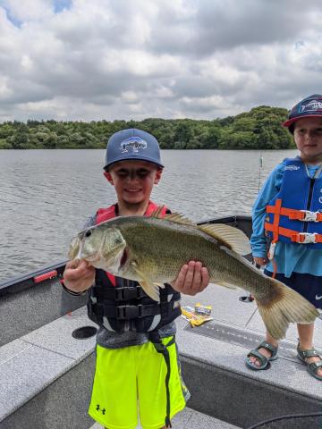 kid with fish