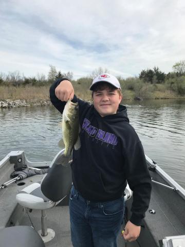 kid with fish