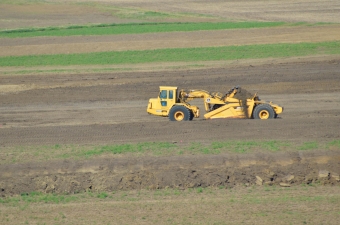 tractor terracing a field